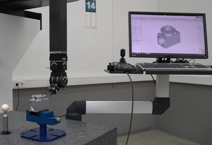 Coordinate measuring machine measuring manifold block part