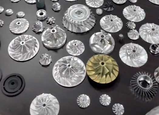 Rapid prototype impeller samples showing different materials