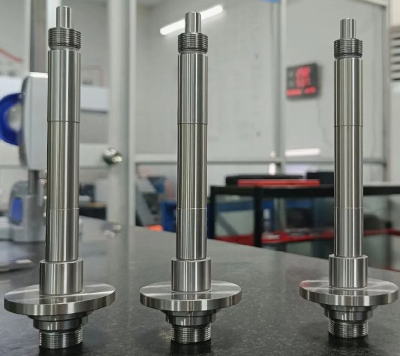 Precision ground shaft with tight dimensional tolerance