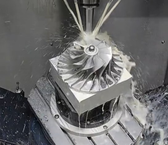 Titanium CNC machining process showing cutting tool and metal chips