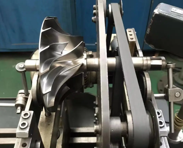 Titanium part being machined by CNC milling machine