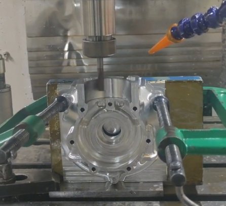 Aluminum CNC machining setup with fixtures and cutting tools