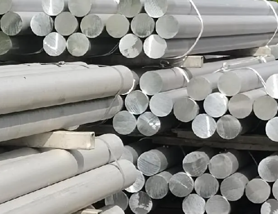 Raw aluminum rod prepared for CNC machining